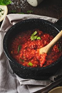 Homemade pizza sauce prepared in a pan
