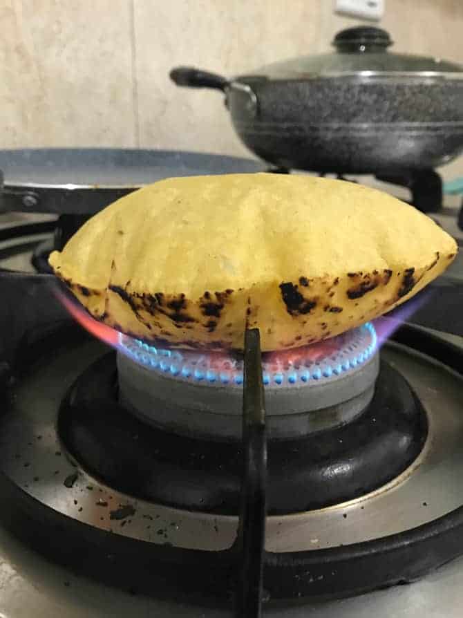 Makki Ki Roti cooking on open flame