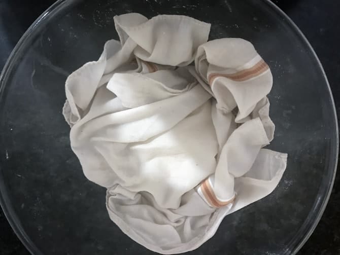 Dough covered with cotton hanky to rest for a while