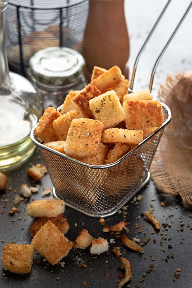 Crisp Garlic Croutons served in a metal basket