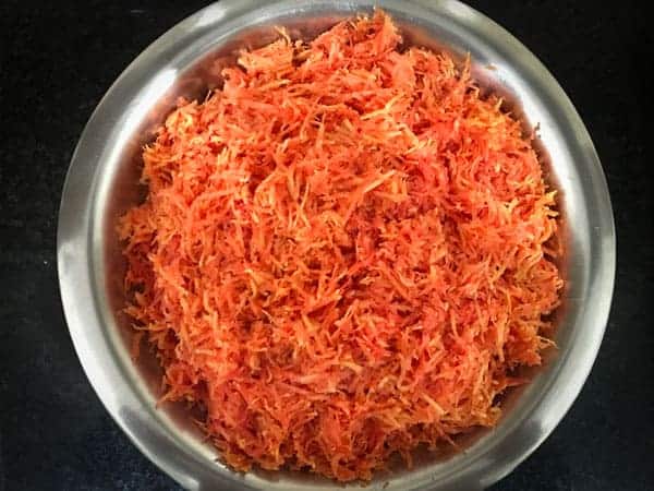 Grated Red carrots in a large bowl ready for the making of gajar ka halwa.