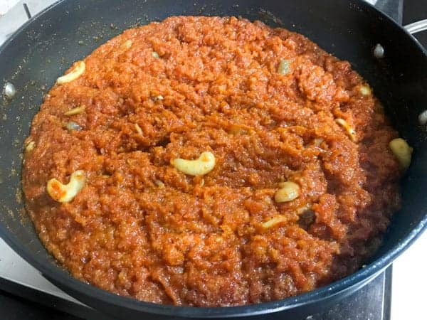 Cooked gajar ka halwa sweet in a pan is ready to be served.