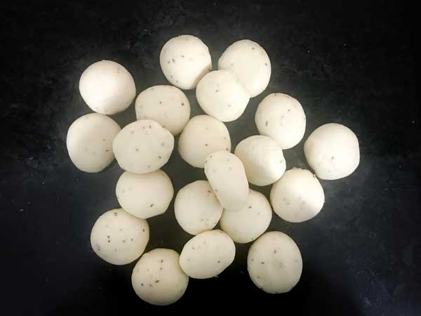 Kachori dough divided into small balls.