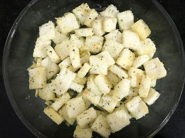 Bread cubes mixed well with seasonings