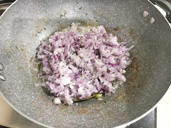 Chopped onions added in pan