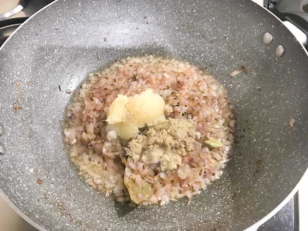 garlic paste and ginger paste added in pan to make chicken kali mirch