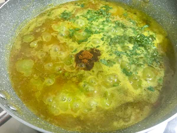 Garam masala powder and chopped coriander leaves added in pan