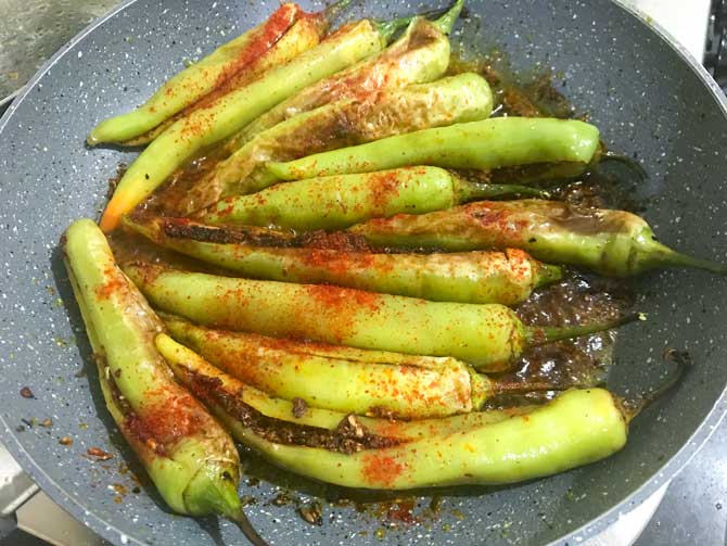 Red Chilli powder and lemon juice added in pan