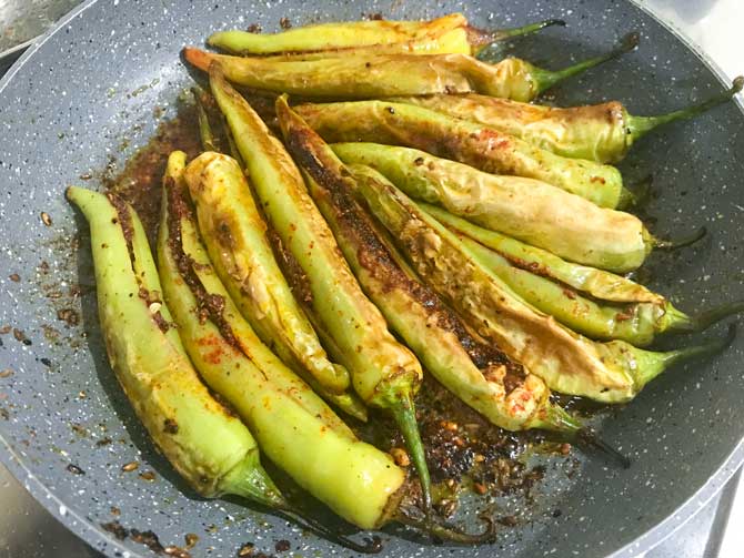 Achari bharwa mirchi fry ready in pan