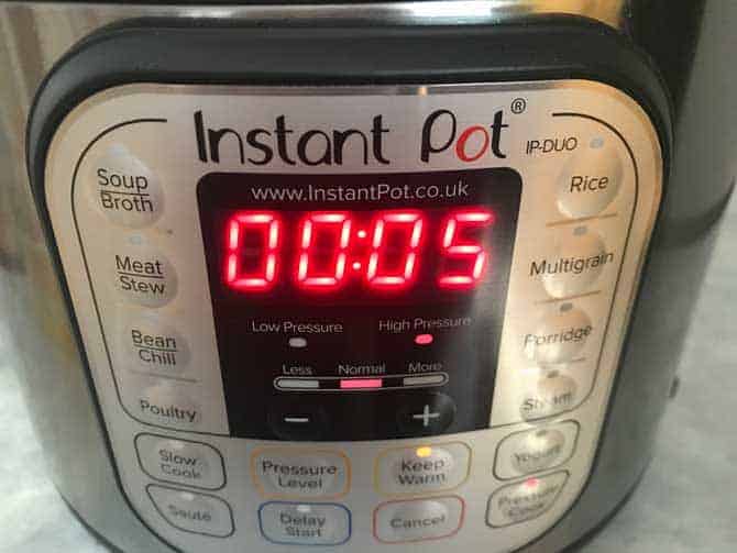 Timer set to 5 minutes in instant pot to cook jeera rice