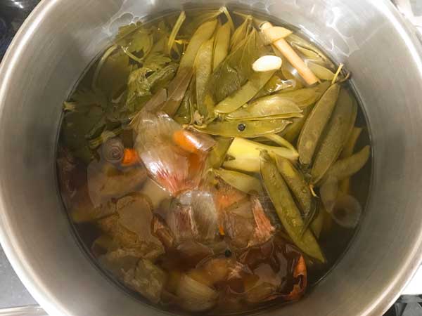 Vegetable stock ready in pot
