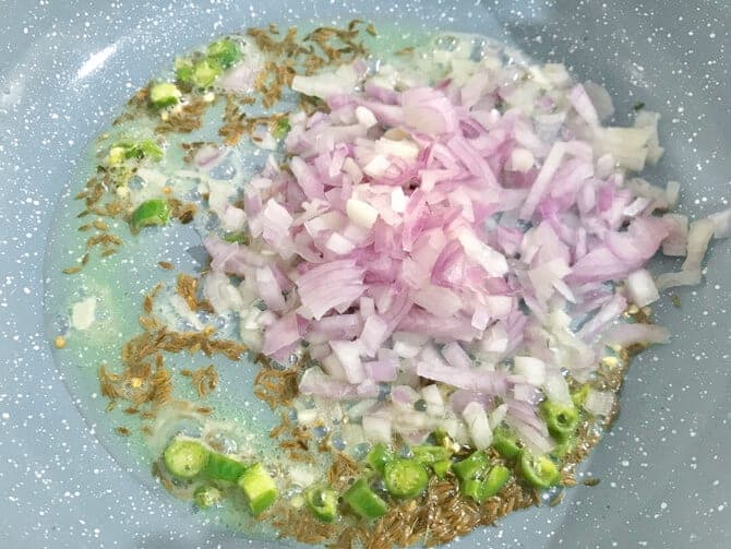 Chopped onions added in pan