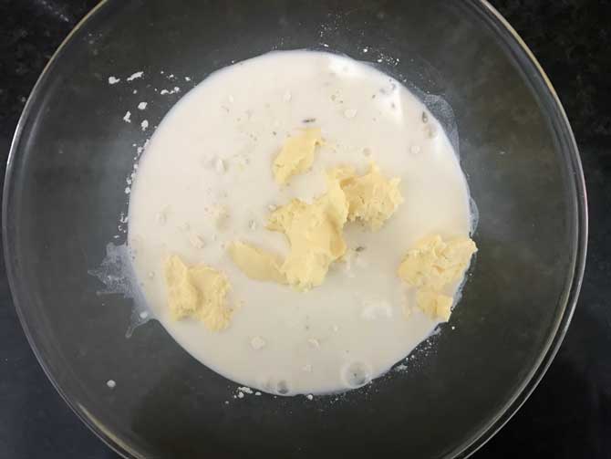 Milk, khoya, yogurt added in bowl