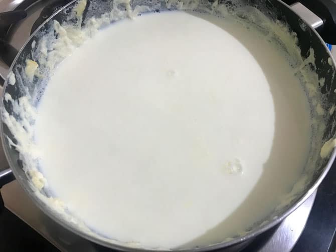 Malai or cream collecting to the sides of the pan.