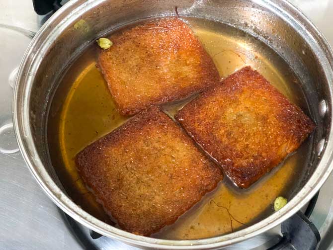 Fried bread slices dipped in sugar syrup to makeDelhi style shahi tukda recipe