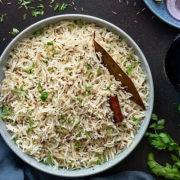 Close up shot of Jeera Rice served in bowl