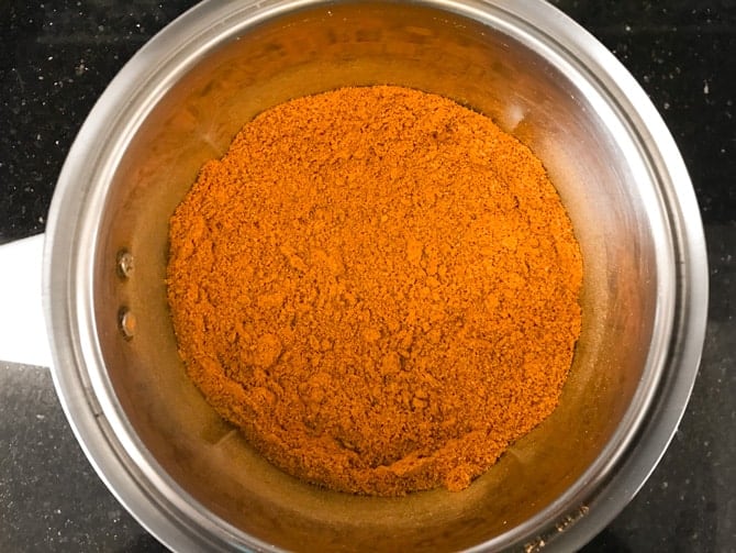 Ground Sambar powder in a blender jar.