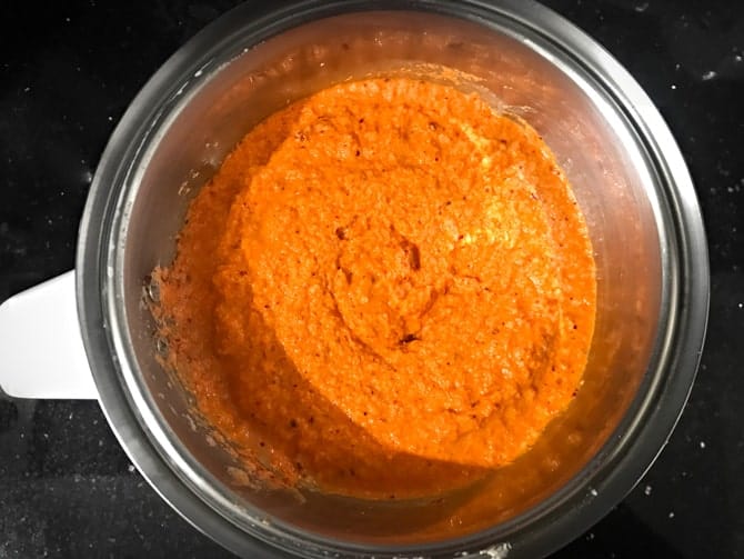 Ground red chilli coconut chutney in blender jar.