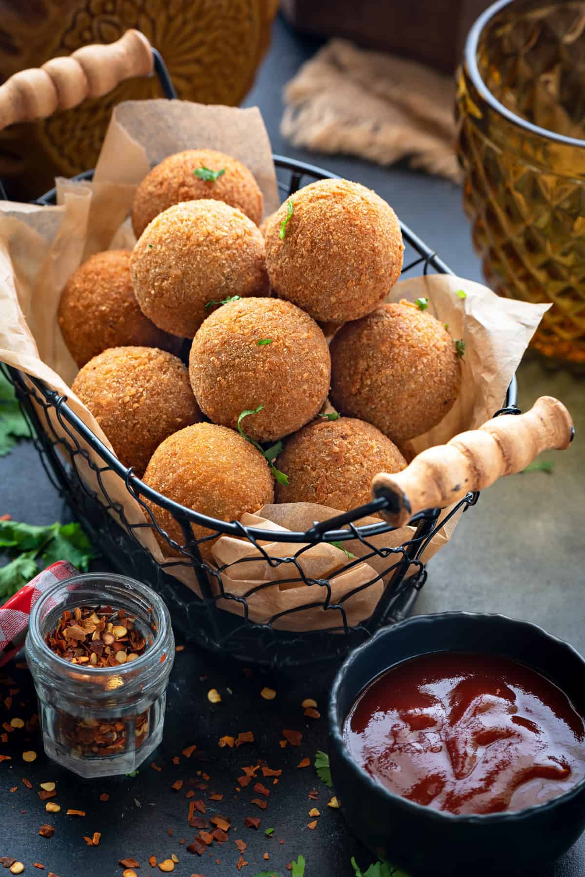 Crisp corn and cheese balls served in basket.