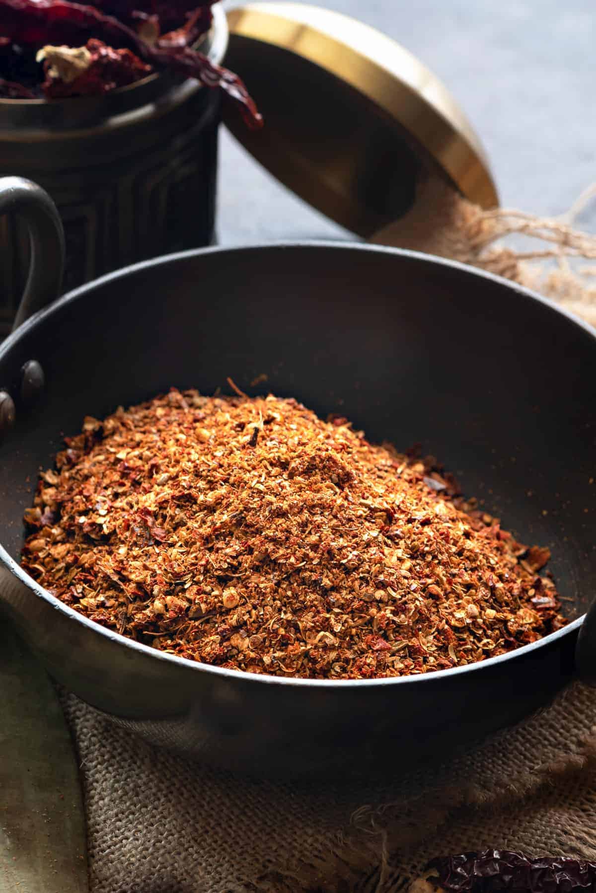 Close up shot of kadai masala powder in Indian wok.