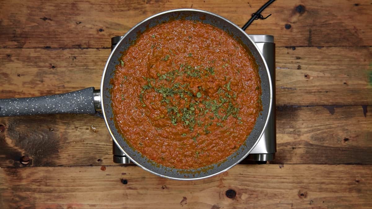 Cooked vegetable bhaji gravy in pan.