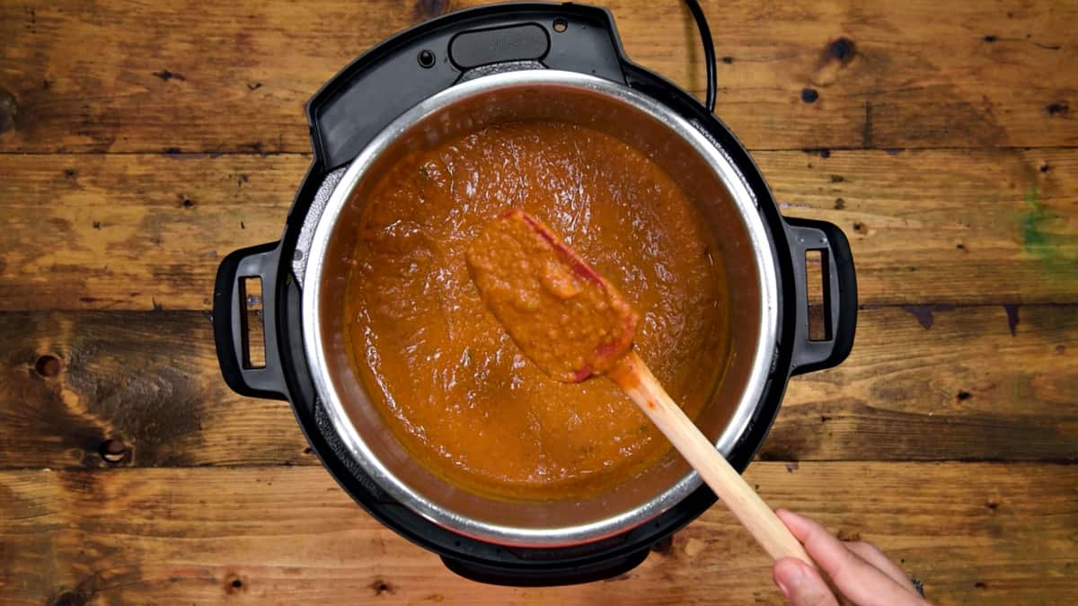 Cooked vegetable bhaji in the steel pot of Instant Pot.