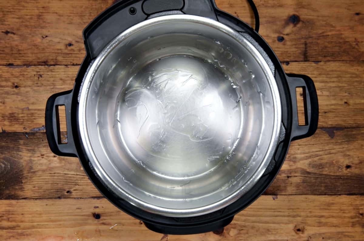 Steel insert of the Instant Pot brushed with olive oil.