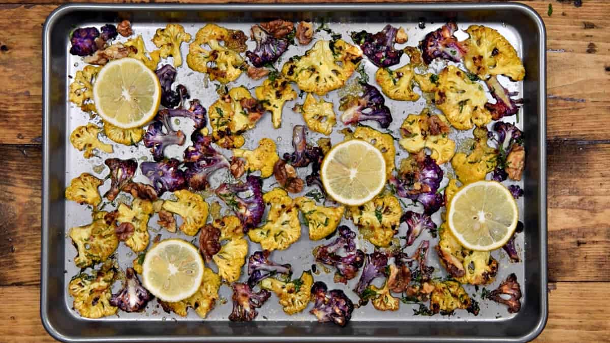 completed oven roasted cauliflower parmesan on a sheet pan