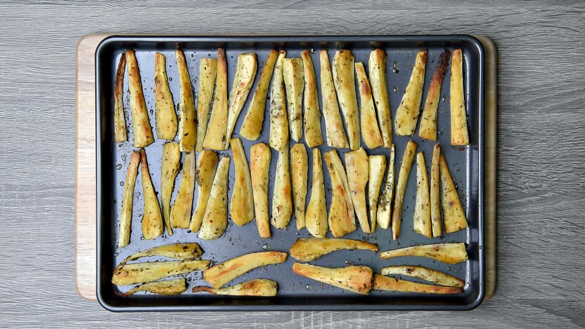 roasted parsnips on a sheet pan