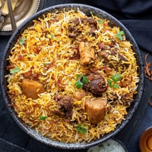 Lamb Mutton Biryani served in black bowl