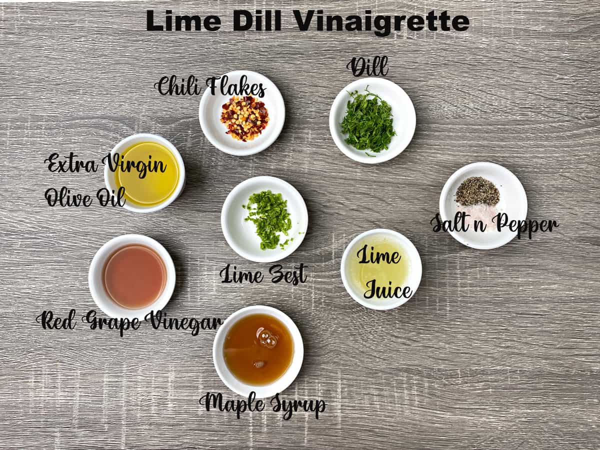 ingredients for lime dill vinaigrette measured out in small white bowls