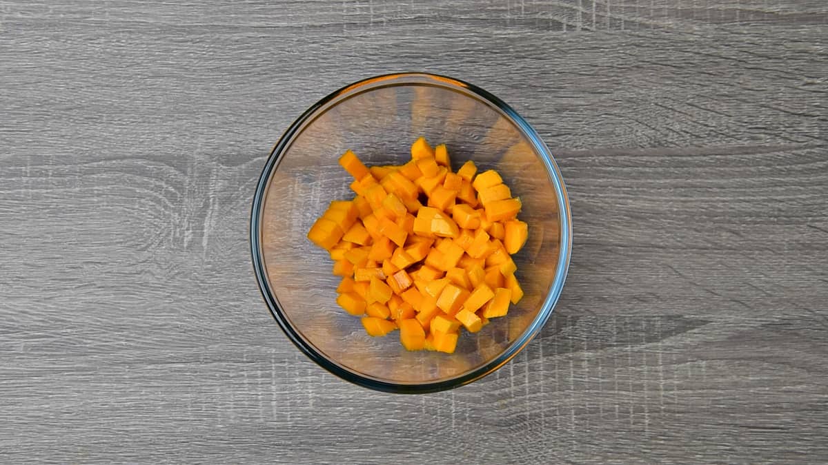 mango cubes in a clear glass bowl