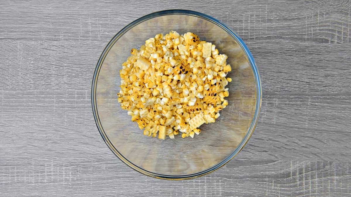 roasted corn kernels removed from the cob and added to a clear mixing bowl