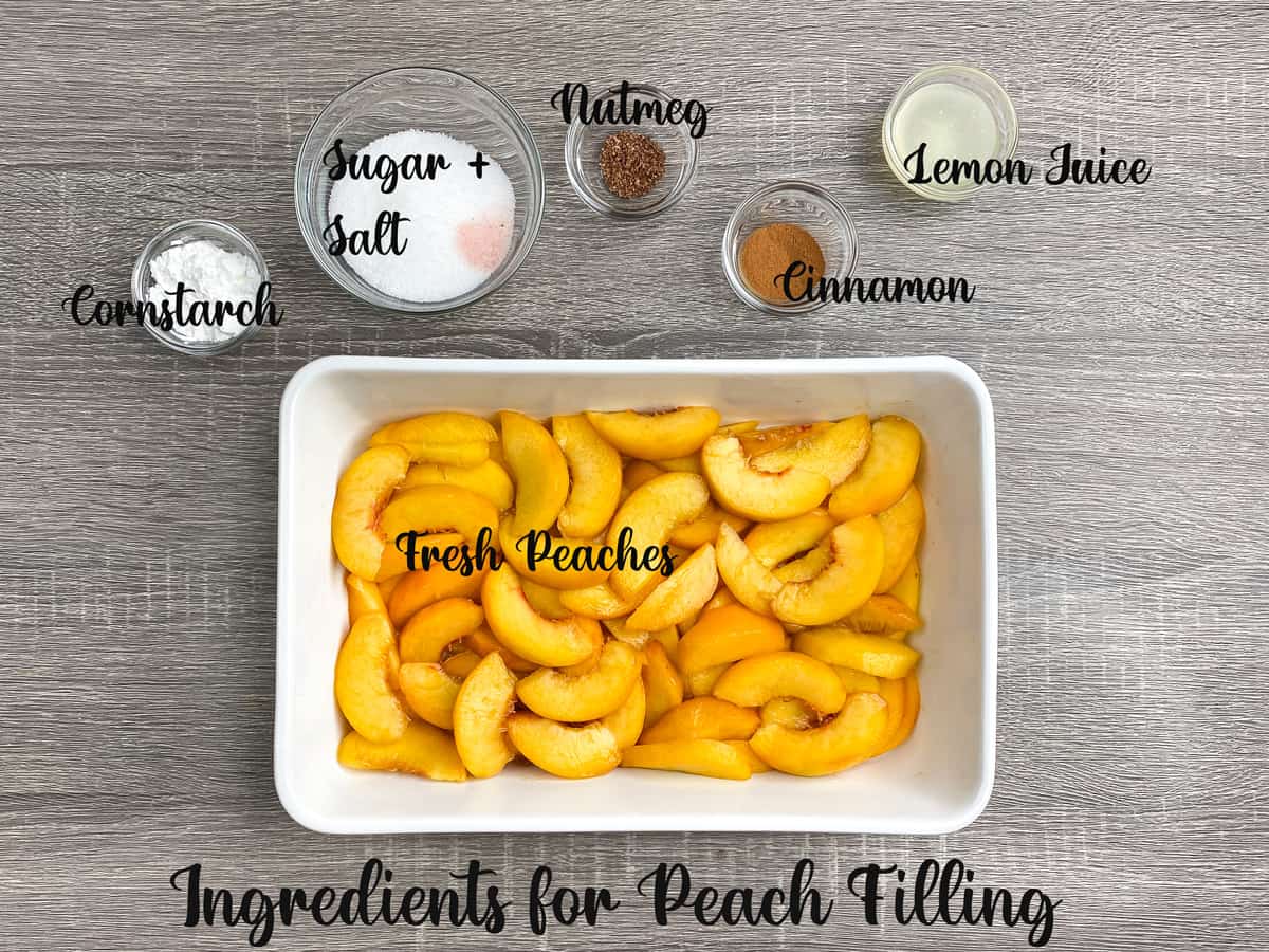 ingredients for making peach cobbler filling measured out and laid on a table