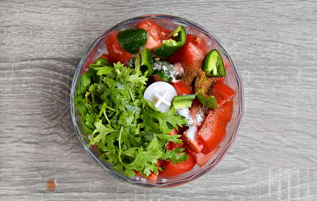 remaining salsa ingredients added to food processor