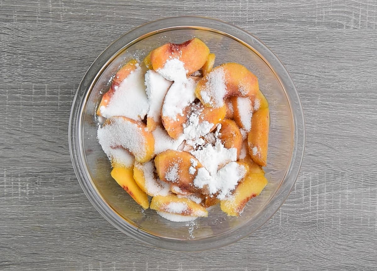 peach filling ingredients added to a mixing bowl