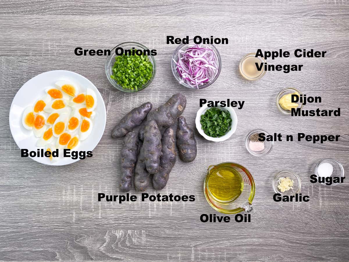 ingredients for warm purple potato salad recipe measured out into bowls