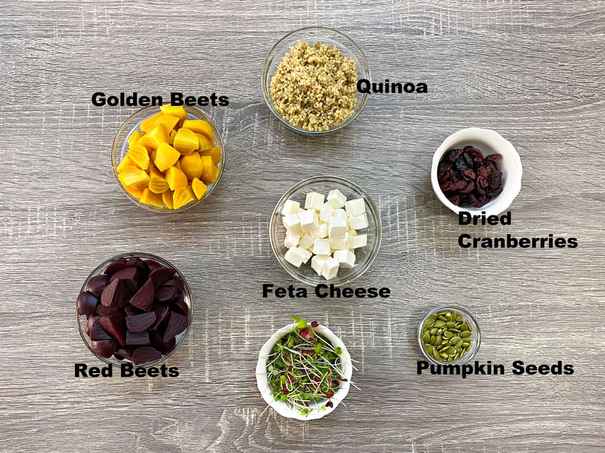 golden beets, quinoa, cranberries, feta, pumpkin seeds, microgreens, red beets in bowls