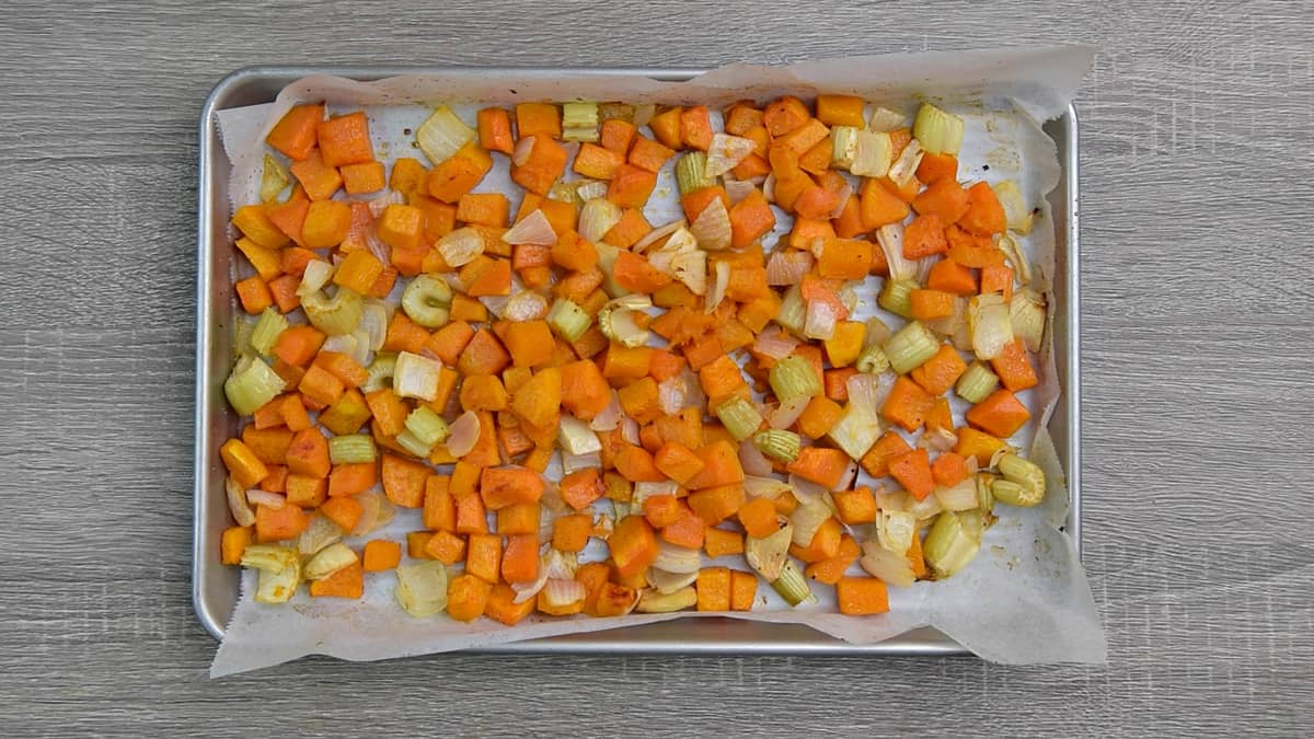 roasted veggies on tray with parchment paper 