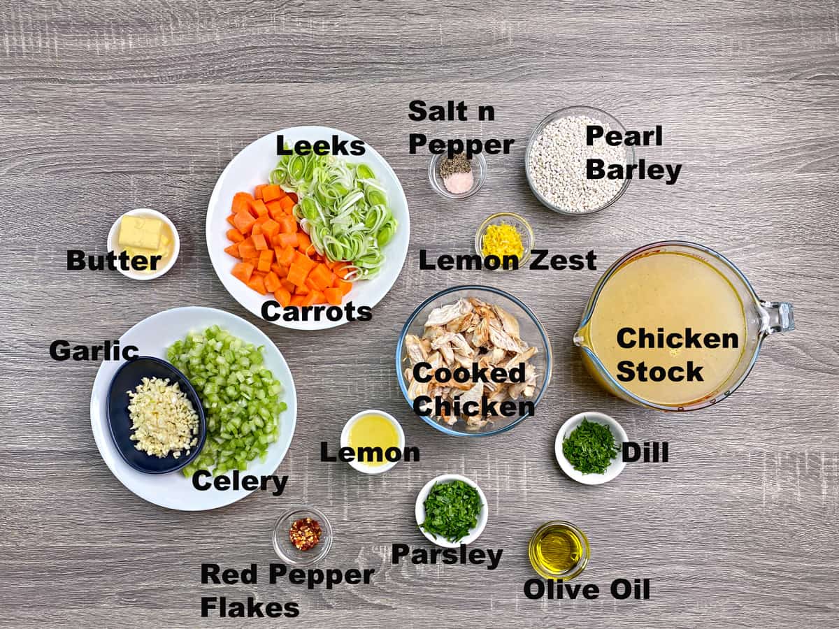 leeks, carrots, salt, pepper, barley, chicken stock, chicken, dill, oil, parsley, lemon, red pepper flakes, garlic, celery, butter, 