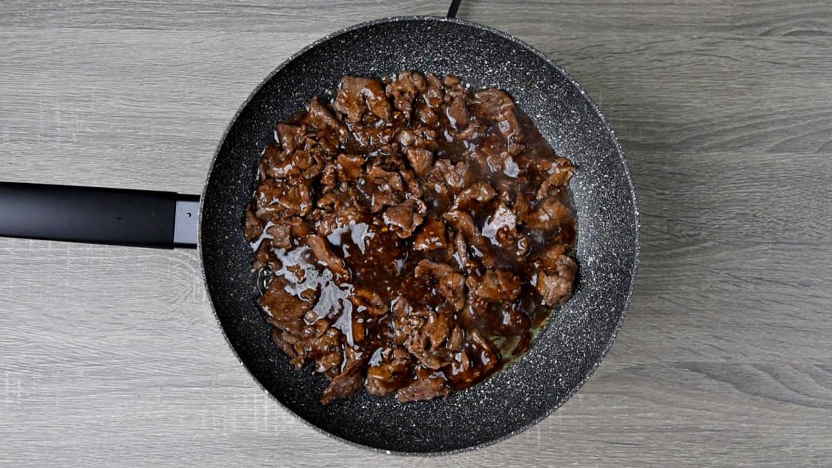 Finished beef strips mixed with teriyaki style sauce. 