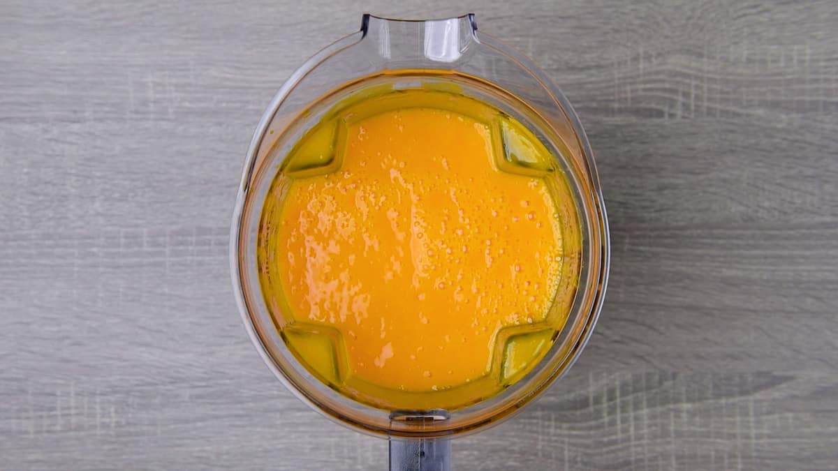 pure mango nectar juice in a blender jar.