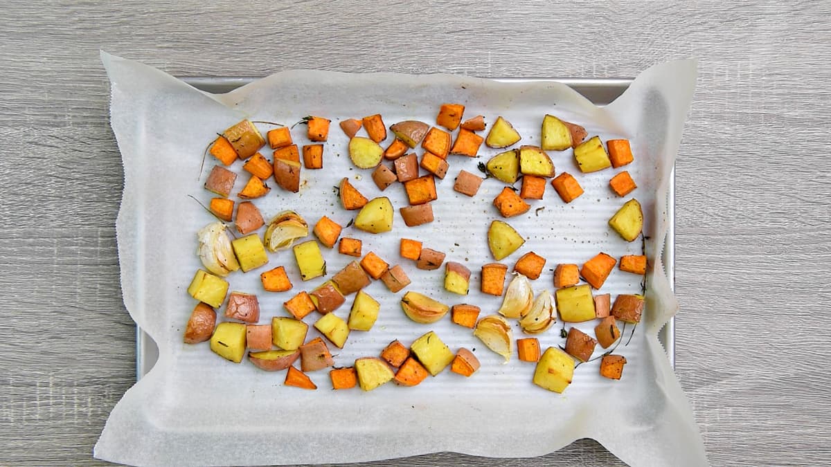 Roasted potatoes on a baking sheet.