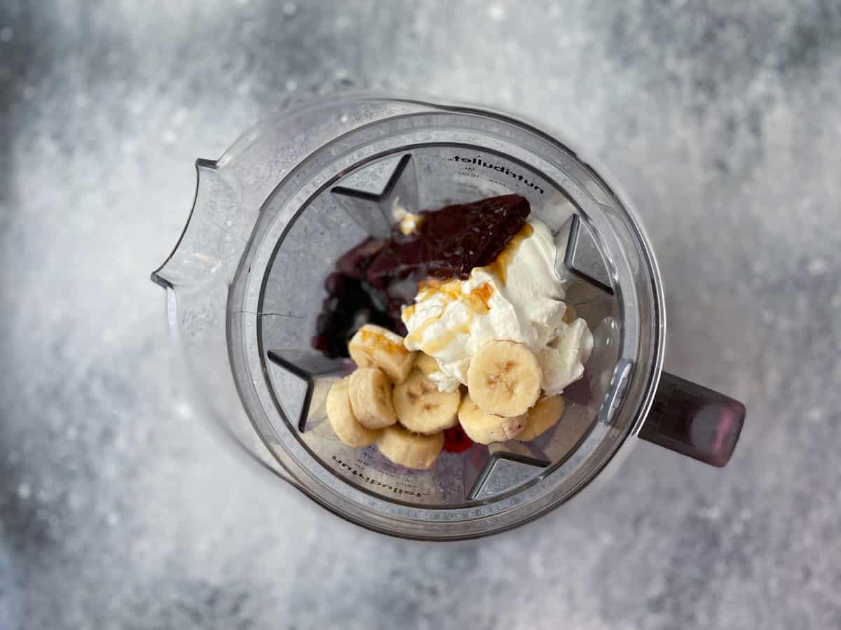 Recipe ingredients in a blender jar.