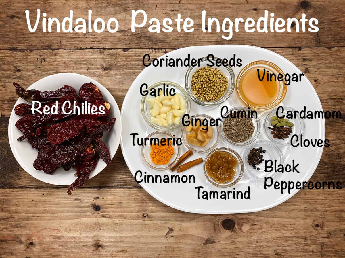 Lamb vindaloo paste ingredients in individual bowlsbowls. 