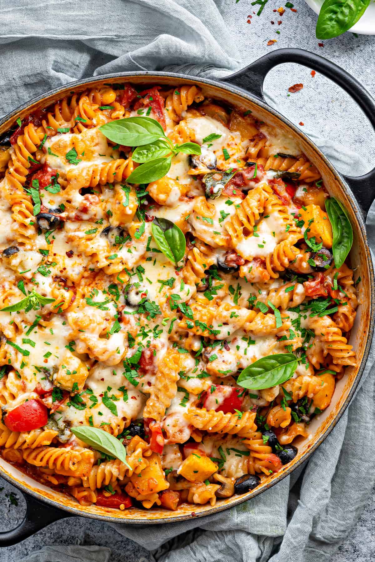 Close-up of veg pasta dish in a pot.