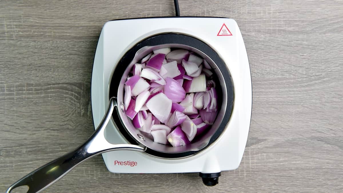 Diced onion in a sauce pan.