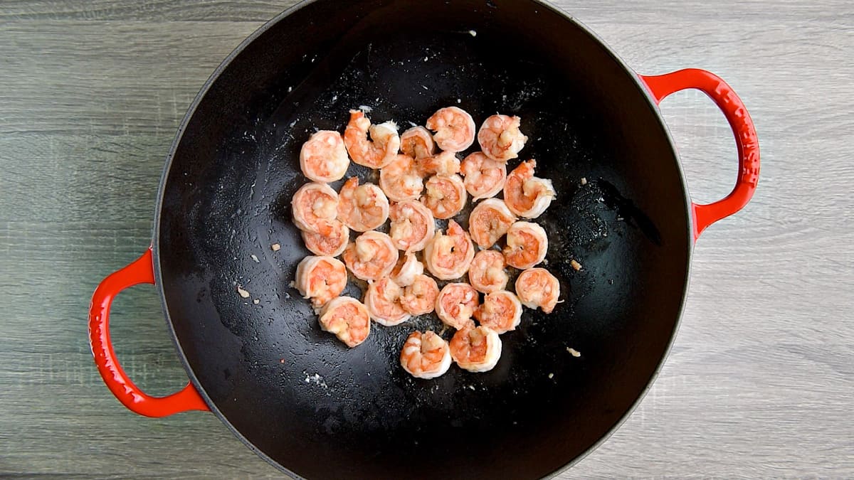 Cooking shrimp in a wok.