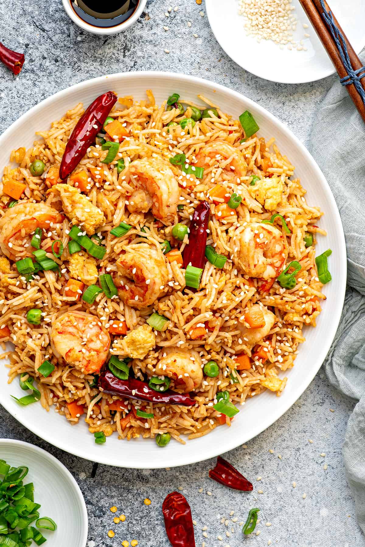 White bowlful of Chinese shrimp fried rice.