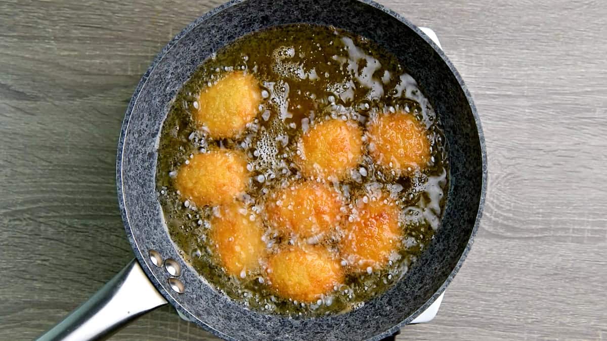 Nuggets frying in oil.